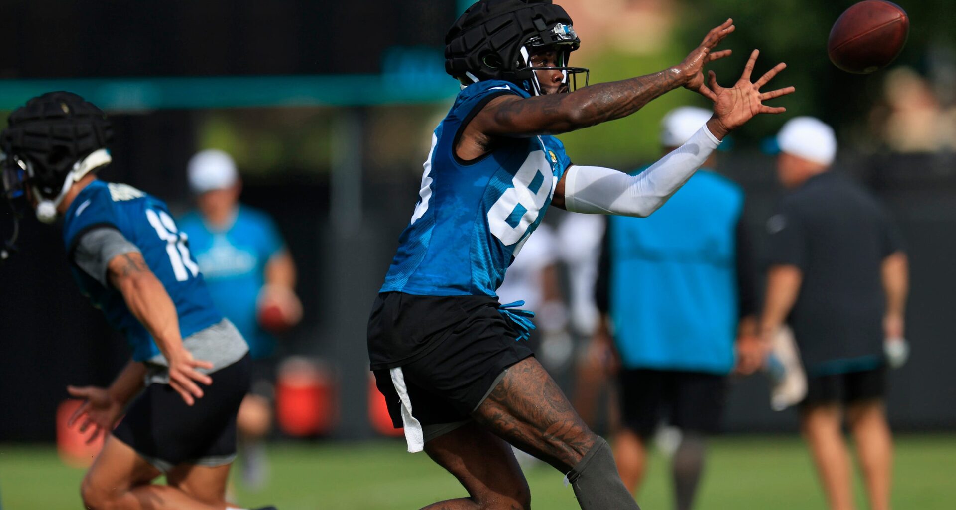 Jacksonville Jaguars wide receiver Denzel Mims (83) catches a pass during the third day of an NFL football training camp practice Friday, July 26, 2024 at EverBank Stadium’s Miller Electric Center in Jacksonville, Fla.
