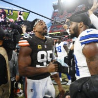 Sep 8, 2024; Cleveland, Ohio, USA; Cleveland Browns defensive end Myles Garrett (95) talks to Dallas Cowboys linebacker Micah Parsons (11) after the game at Huntington Bank Field.