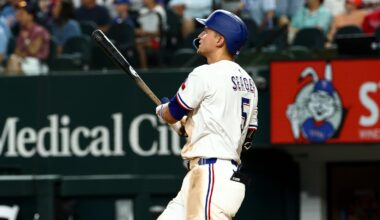 Jul 22, 2025; Arlington, Texas, USA; Texas Rangers shortstop Corey Seager (5) hits a three-run home run during the seventh inning against the Athletics at Globe Life Field. Mandatory Credit: Kevin Jairaj-Imagn Images