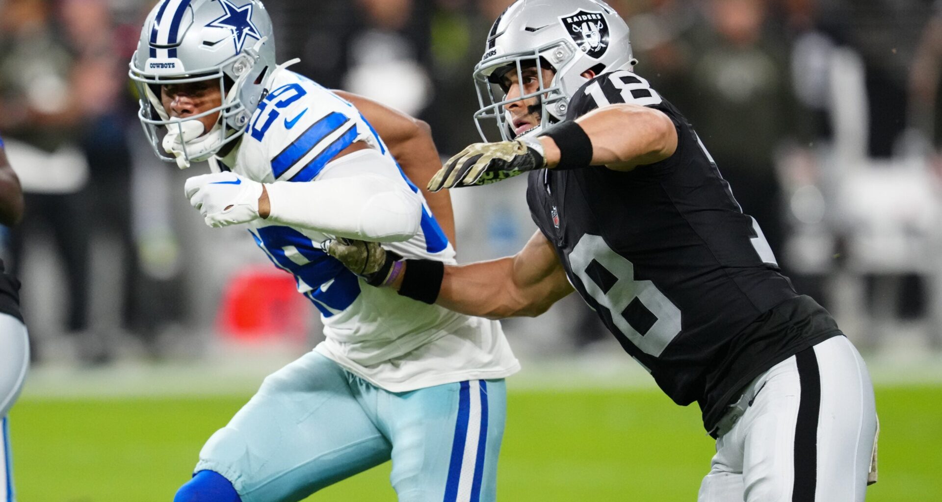 Nov 17, 2025; Paradise, Nevada, USA; Dallas Cowboys cornerback C.J. Goodwin (29) defends against Las Vegas Raiders wide receiver Jack Bech (18) during the first half at Allegiant Stadium.