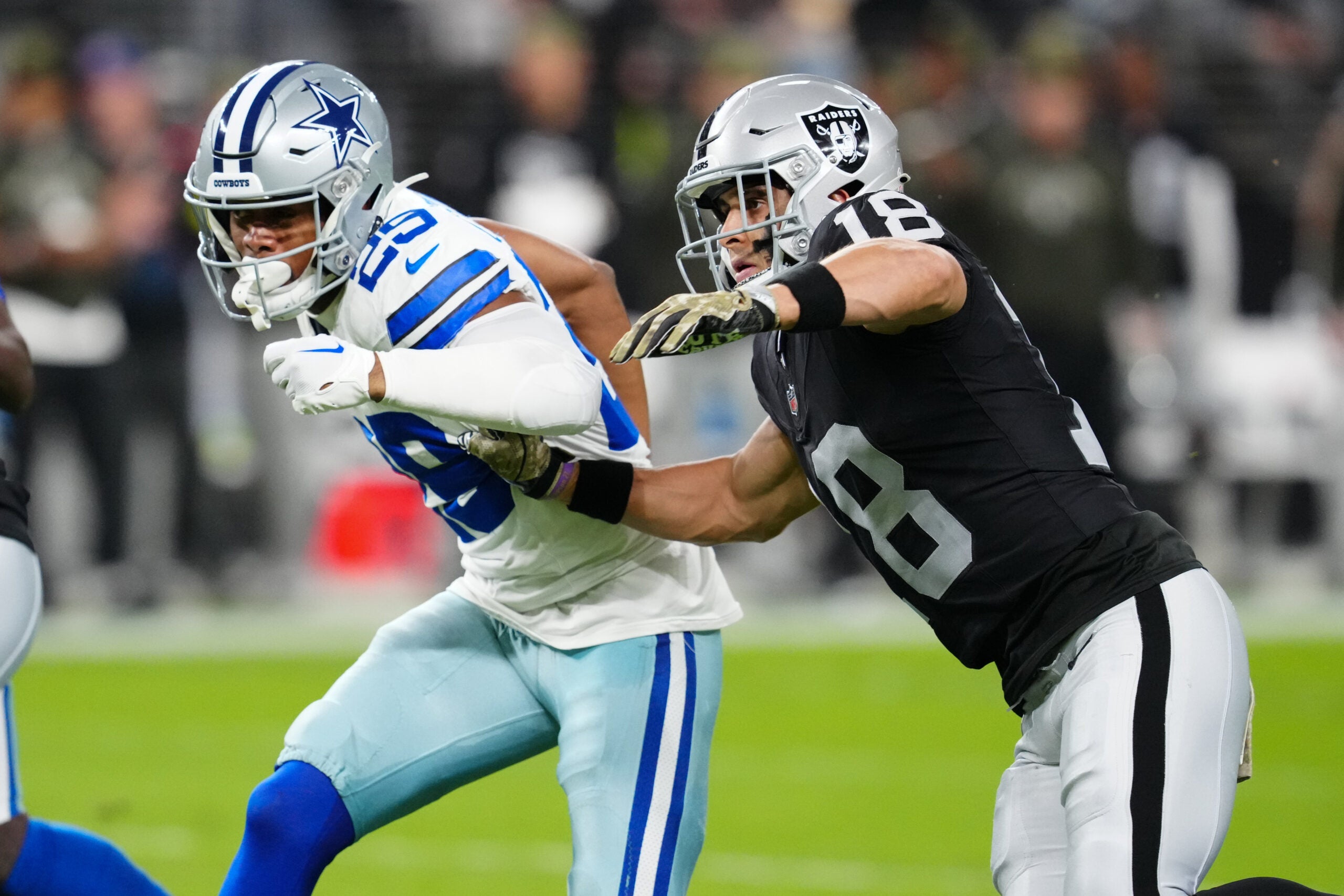 Nov 17, 2025; Paradise, Nevada, USA; Dallas Cowboys cornerback C.J. Goodwin (29) defends against Las Vegas Raiders wide receiver Jack Bech (18) during the first half at Allegiant Stadium.