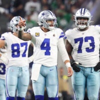 Nov 23, 2025; Arlington, Texas, USA; Dallas Cowboys quarterback Dak Prescott (4) reacts in the third quarter against the Philadelphia Eagles at AT&T Stadium.