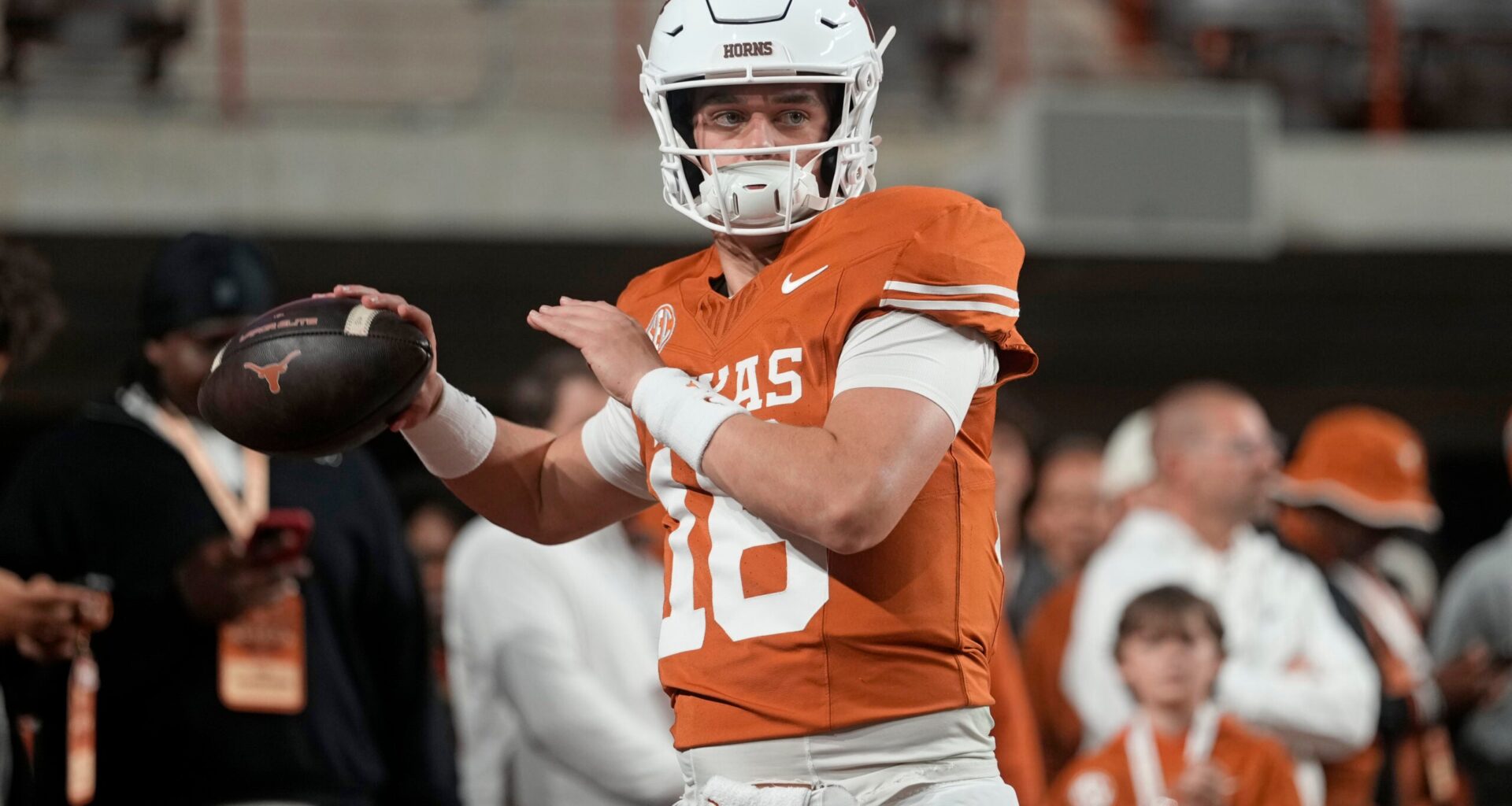 Nov 28, 2025; Austin, Texas, USA; Texas Longhorns quarterback Arch Manning warms up before a game against the Texas A&M Aggies at Darrell K Royal-Texas Memorial Stadium.