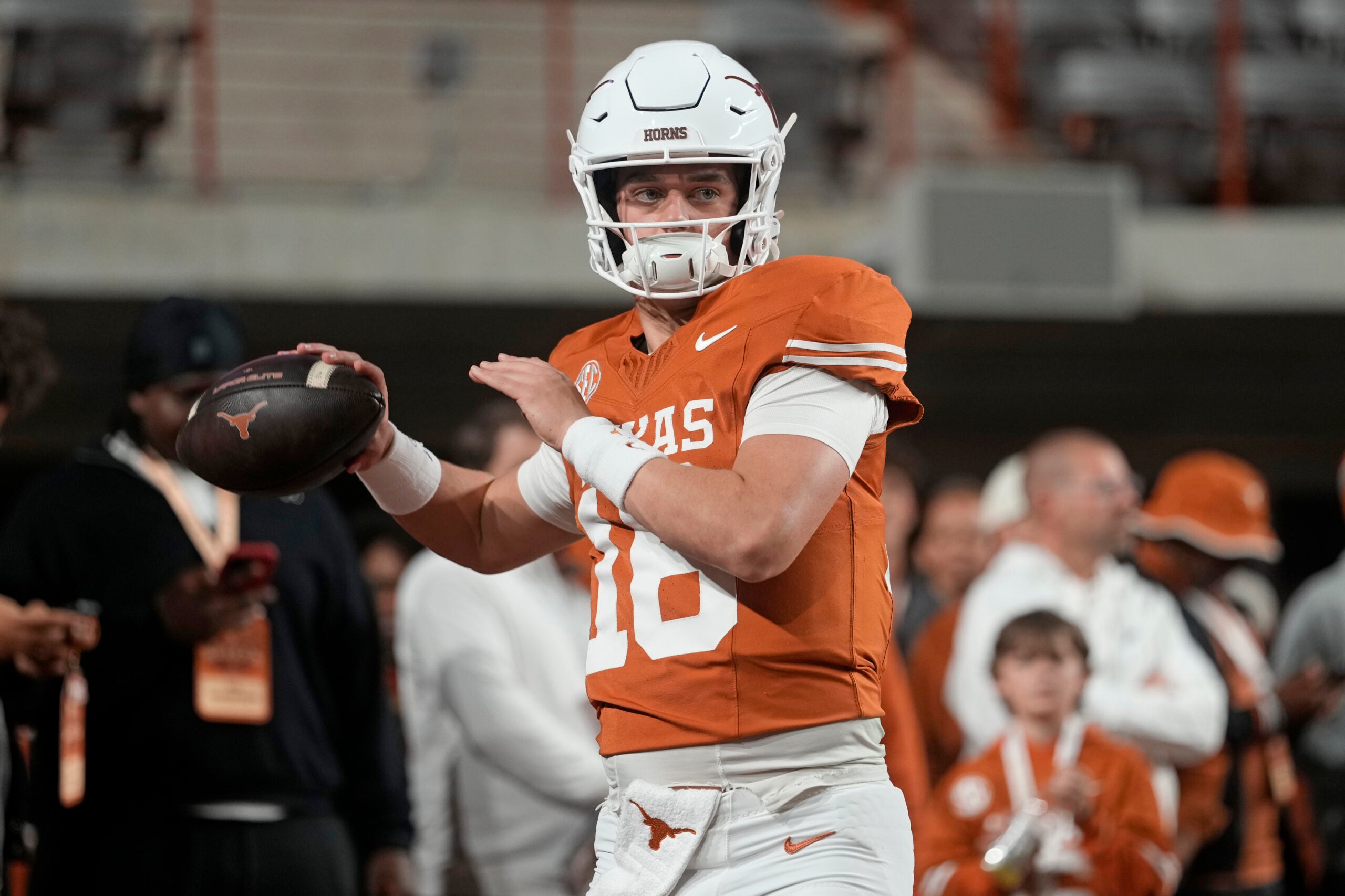 Nov 28, 2025; Austin, Texas, USA; Texas Longhorns quarterback Arch Manning warms up before a game against the Texas A&M Aggies at Darrell K Royal-Texas Memorial Stadium.