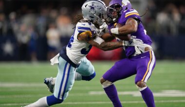 Dec 14, 2025; Arlington, Texas, USA; Dallas Cowboys cornerback Shavon Revel Jr. (34) tackles Minnesota Vikings running back Aaron Jones Sr. (33) during the first half at AT&T Stadium.