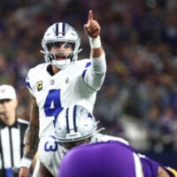 Dec 14, 2025; Arlington, Texas, USA; Dallas Cowboys quarterback Dak Prescott (4) calls signals during the second half against the Minnesota Vikings at AT&T Stadium.