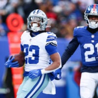 Jan 4, 2026; East Rutherford, New Jersey, USA; Dallas Cowboys running back Jaydon Blue (23) celebrates after scoring a touchdown during the first quarter against the New York Giants at MetLife Stadium.