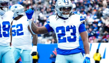 Dallas Cowboys running back Jaydon Blue (23) celebrates after scoring the first touchdown of the game, Sunday, January 4, 2026, in East Rutherford.