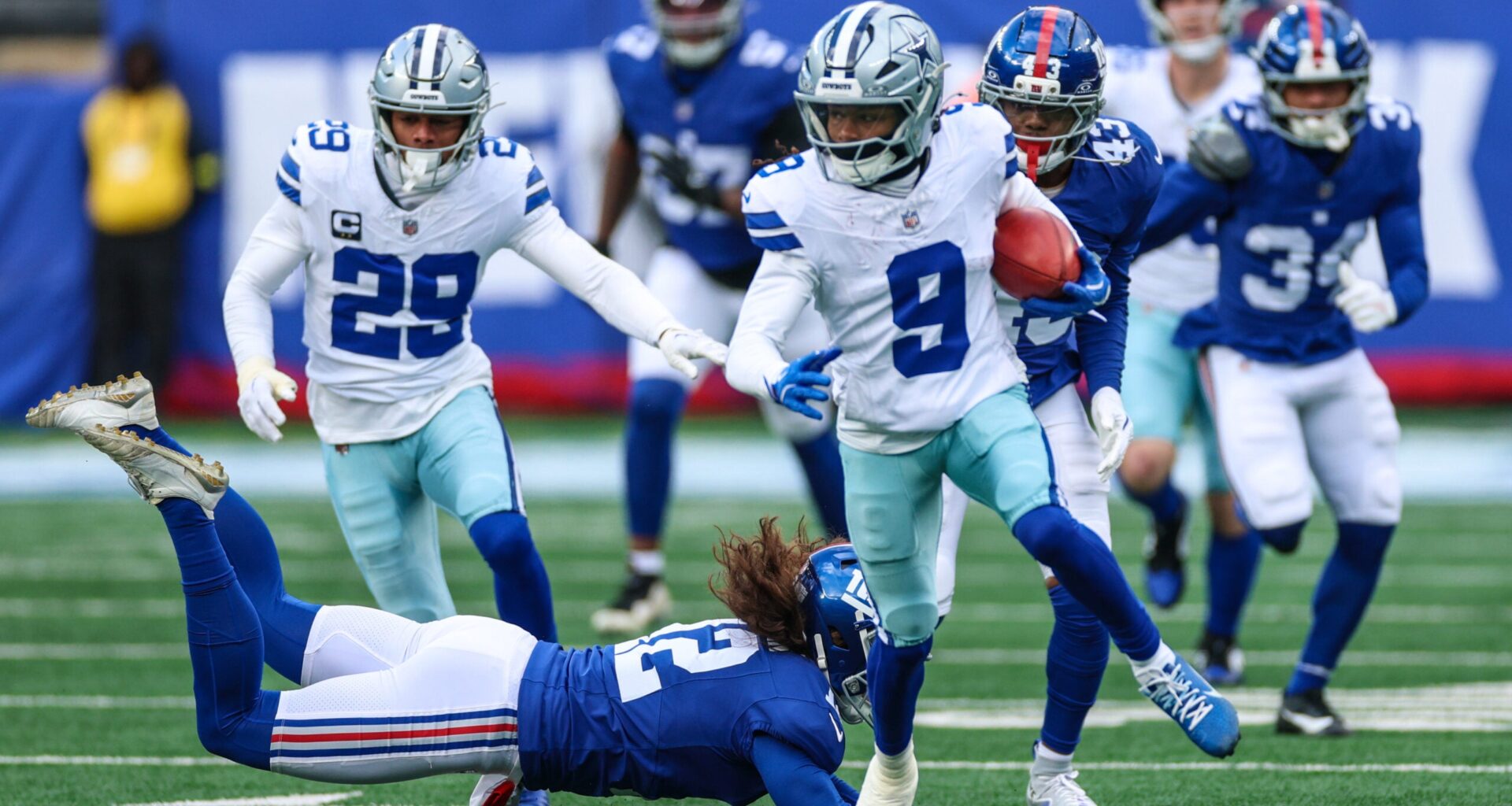 Jan 4, 2026; East Rutherford, New Jersey, USA; Dallas Cowboys wide receiver Kavontae Turpin (9) returns a kickoff as New York Giants punter Jamie Gillan (12) pursues during the second half at MetLife Stadium.