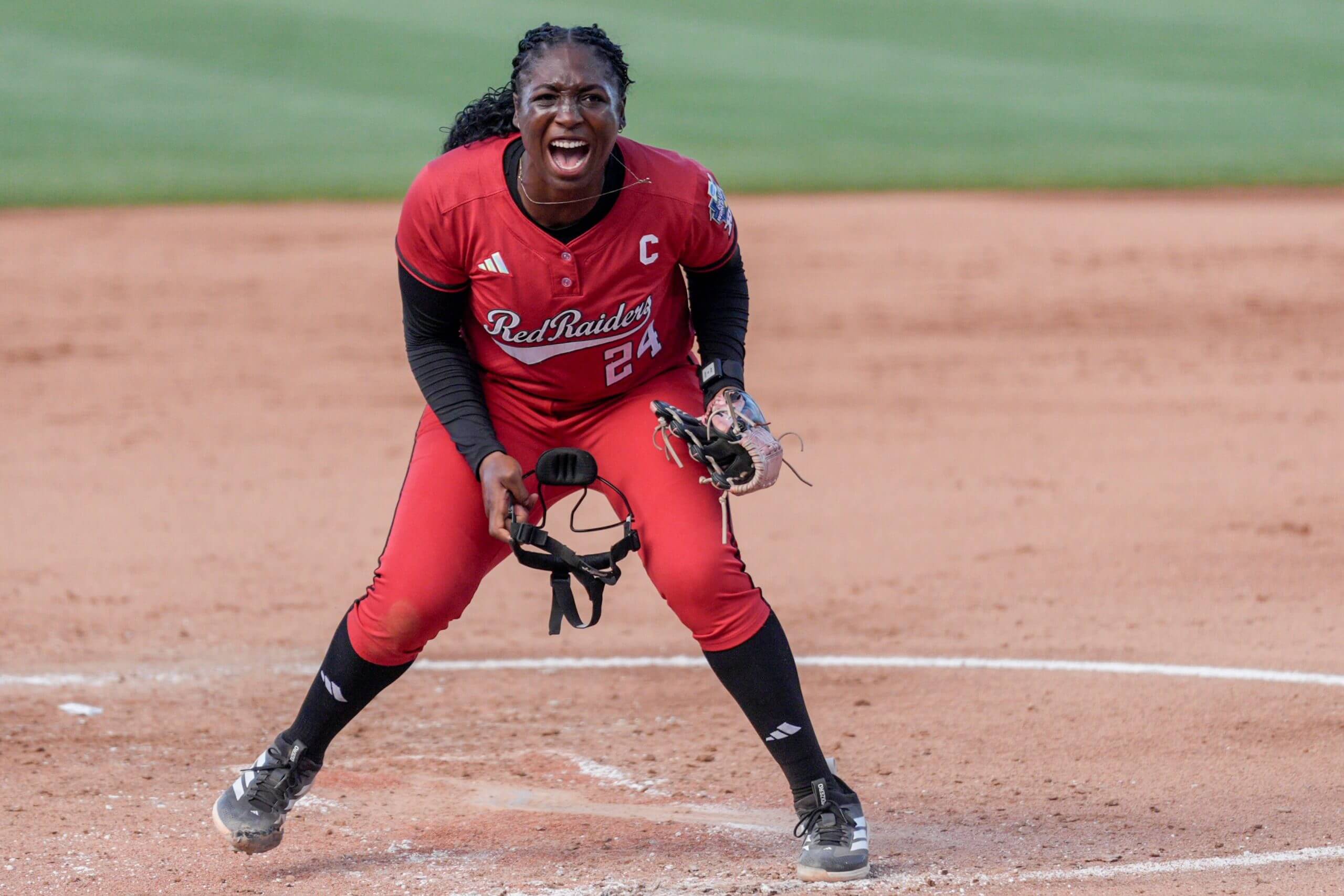Texas Tech pitcher NiJaree Canady celebrates a strikeout during a game.