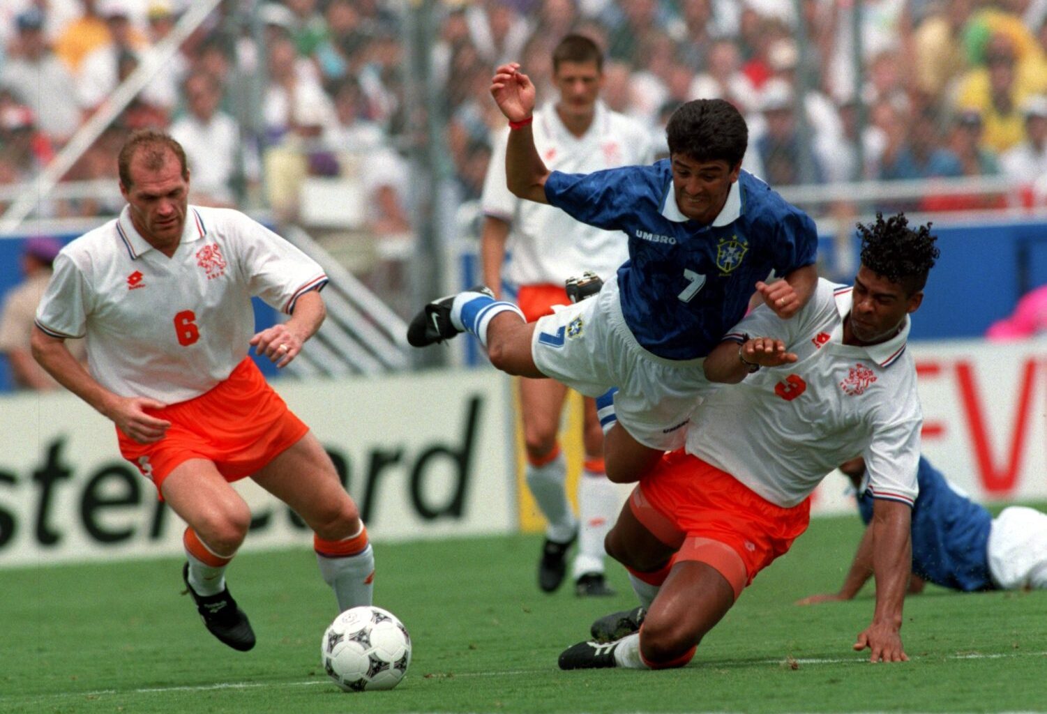 9 Jul 1994: Bebeto of Brazil, in air, and Nouters, right, and Rijkaard of Holland in action during the 1994 World Cup match Brazil v Holland at the Cotton Bowl