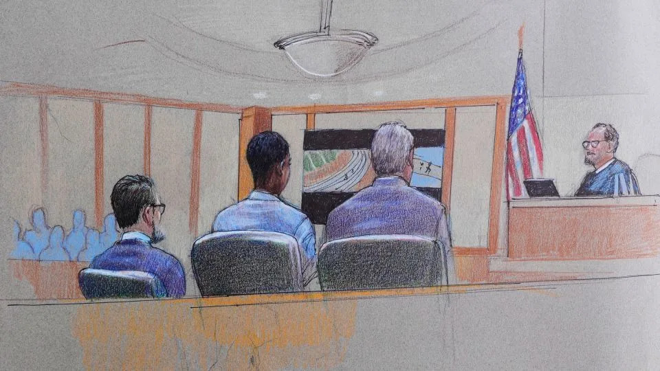 A courtroom sketch, provided by Pat Lopez, shows Karmelo Anthony, center, at the defense table at his murder trial on June 4. - Pat Lopez/AP