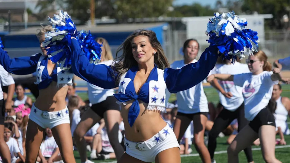Jul 27, 2025; Oxnard, CA, USA; Dallas Cowboys cheerleaders interact with participants in youth clinic at Channel Islands High School.Kirby Lee-Imagn Images