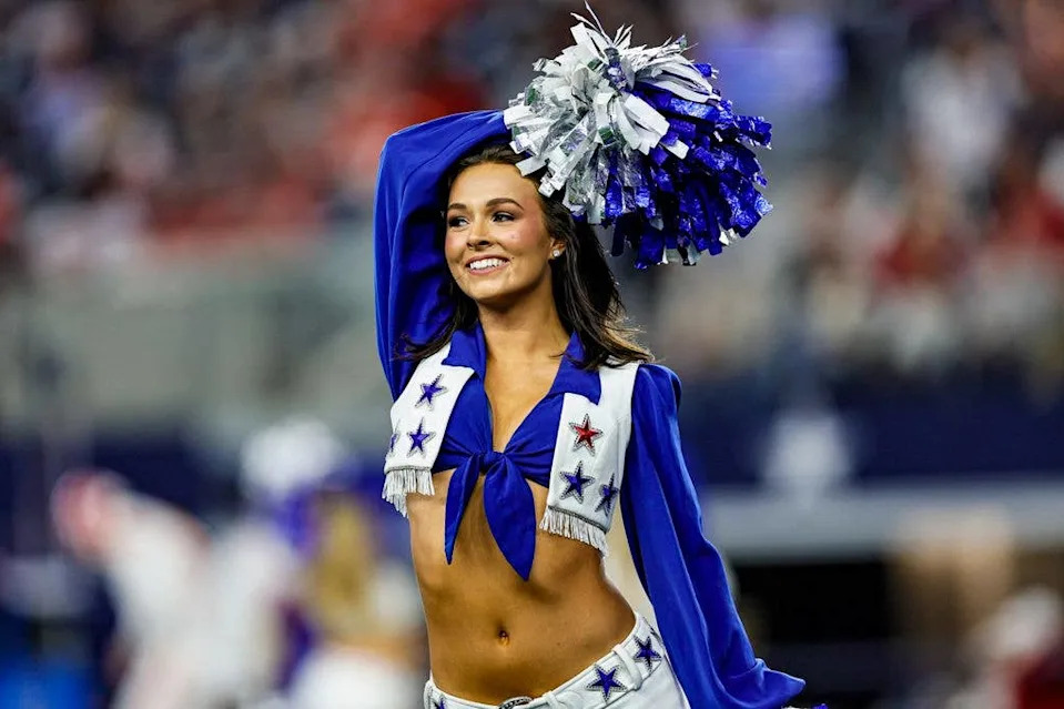 The Dallas Cowboys Cheerleaders perform during the game between the Dallas Cowboys and the Kansas City Chiefs on November 27, 2025 at AT&T Stadium in Arlington, Texas.