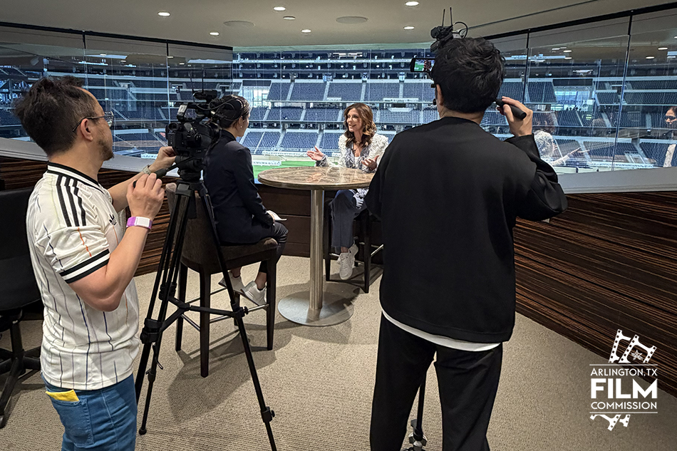 Film Crew at AT&T Stadium interviewing Charlotte Jones.