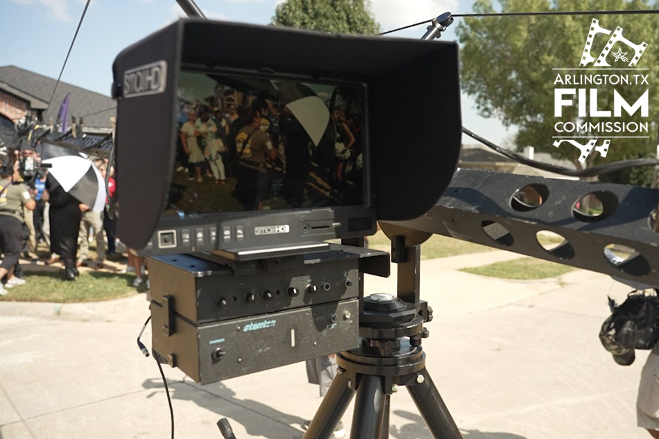 Monitor on camera rig for an outdoor film production.