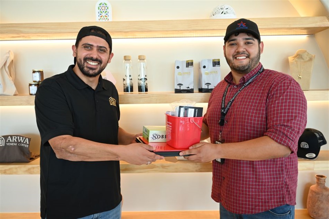 Owner of ARWA and health inspector with welcome kit