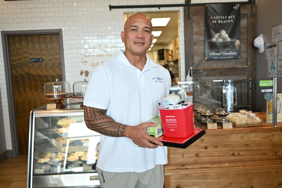 Owner of Buttermilk Sky Pie with welcome kit