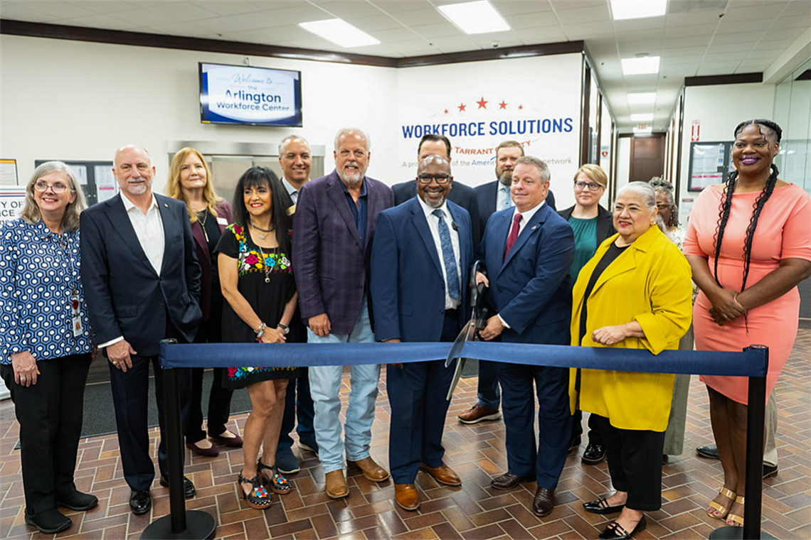 Group of people at a ribbon cutting