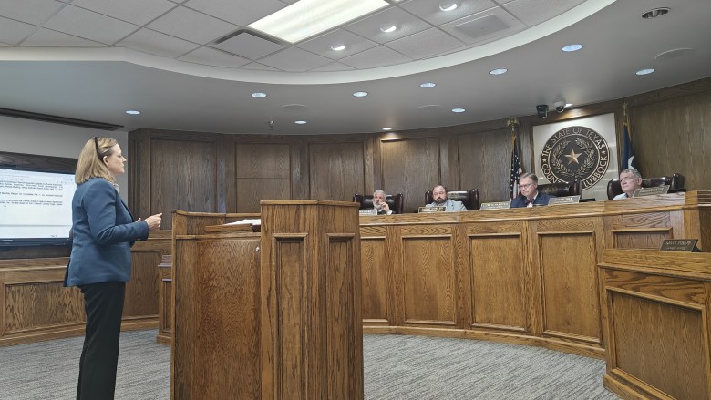 Ashley Cox and county commissioners in Lubbock, Texas.