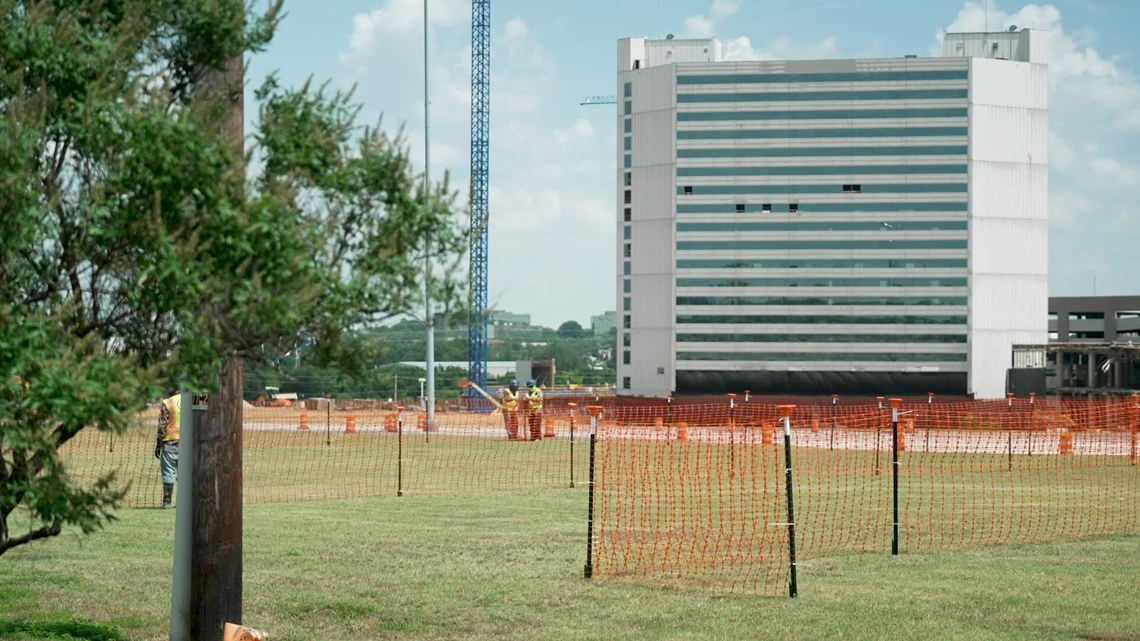 Demolition crews prepare to bring down Arlington's old Sheraton Hotel with dynamite