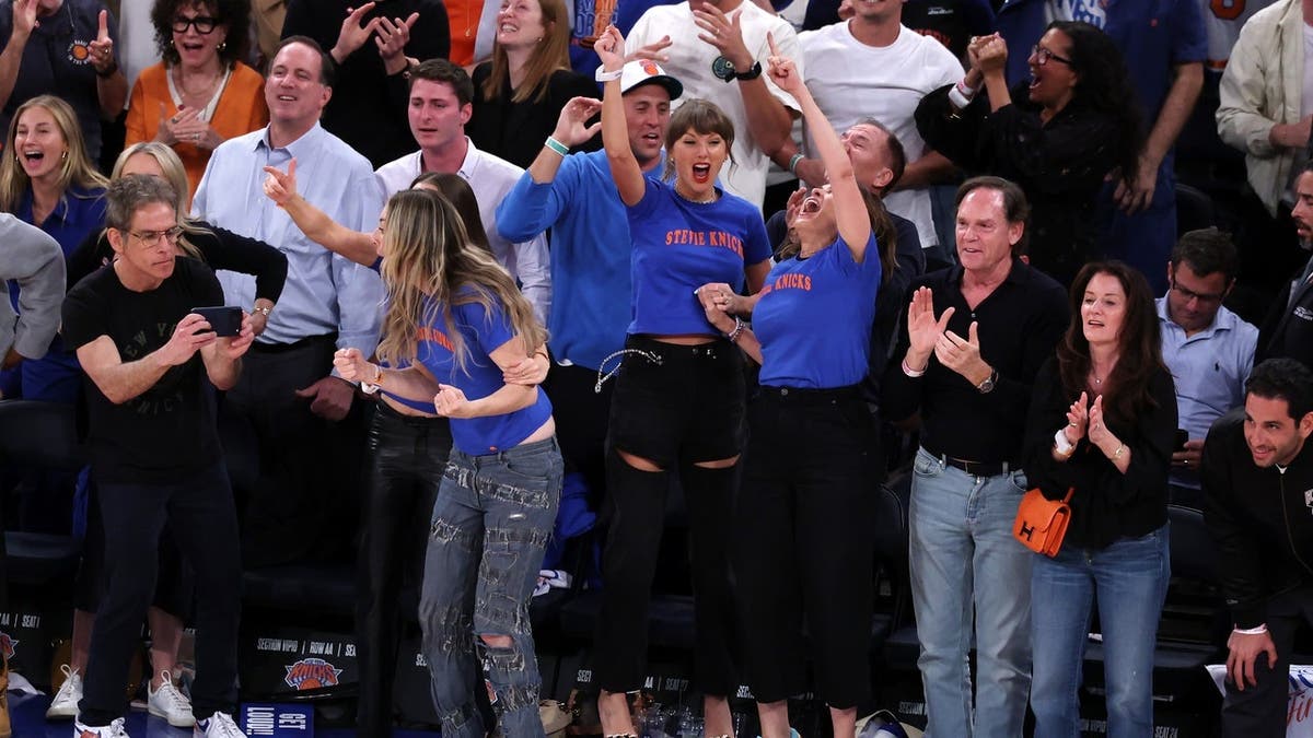 Ben Stiller and Taylor Swift reacting during the 2026 NBA Finals game at Madison Square Garden