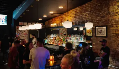 a crowd at The Black Swan Saloon