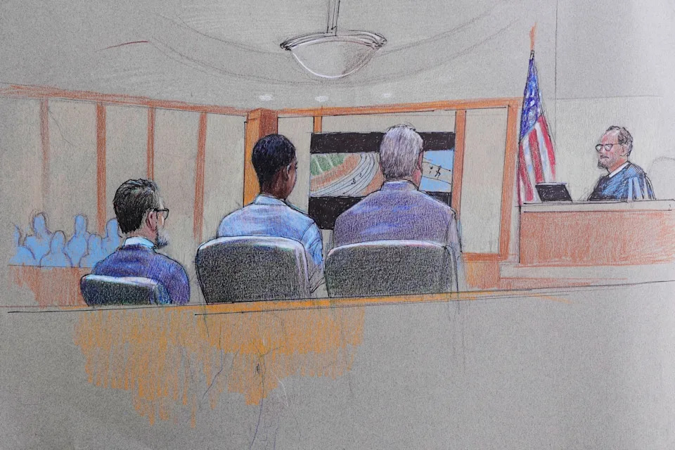 Pat Lopez via AP - PHOTO: A courtroom sketch, provided by Pat Lopez shows Karmelo Anthony, center, at the defense table, the jury on the left and the presiding judge on the right, June 4, 2026, in McKinney, Texas.