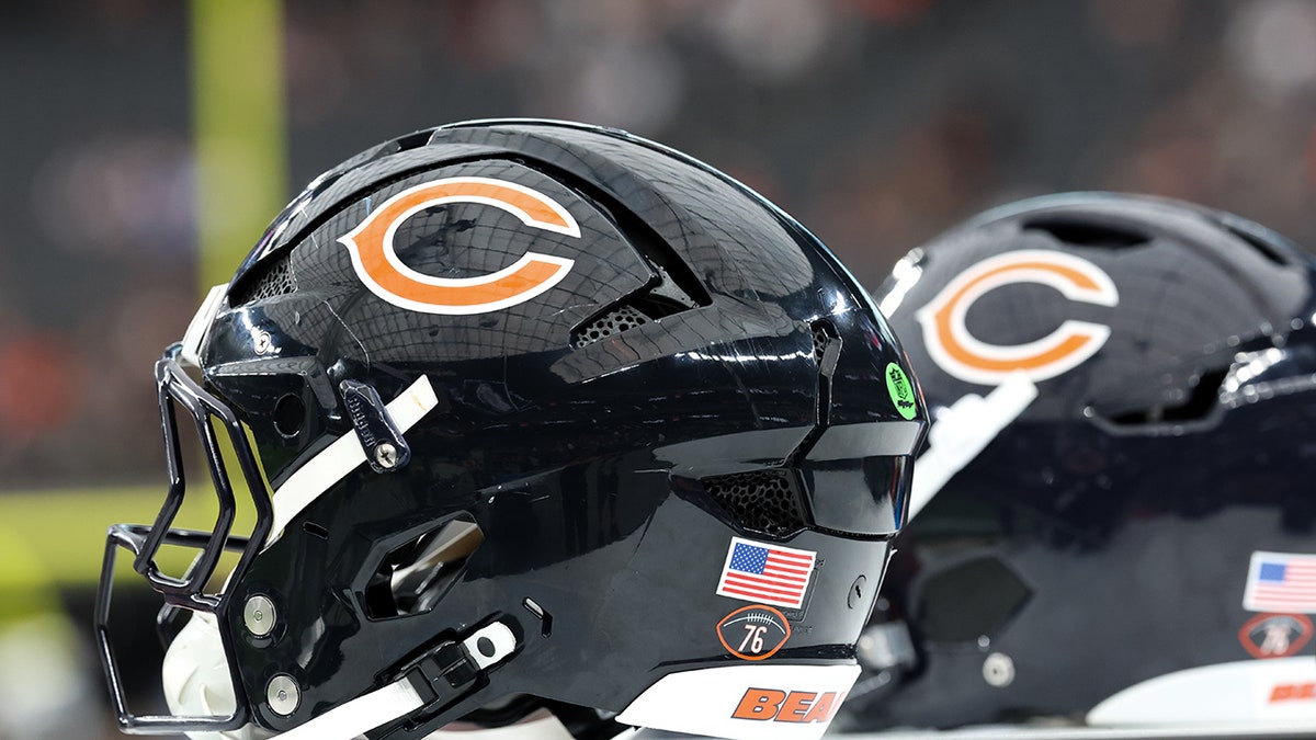 Chicago Bears helmets arranged on a table at Allegiant Stadium.