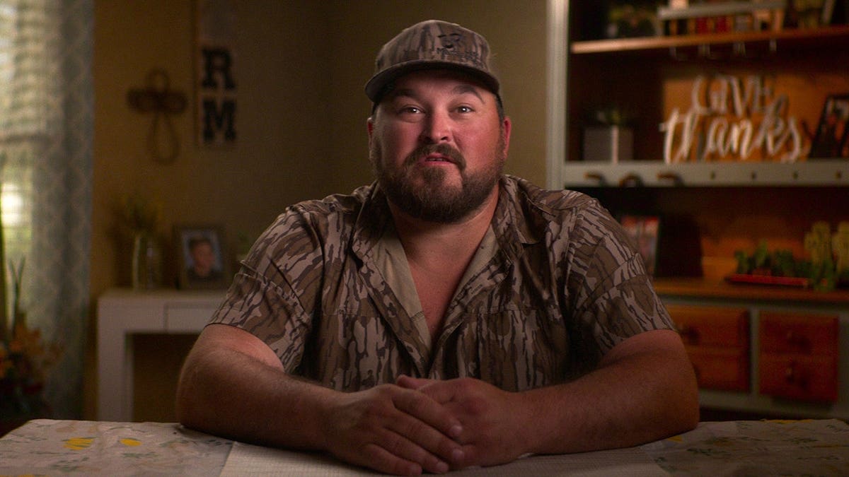 Codey Ott standing in a scene from Maternal Instinct.