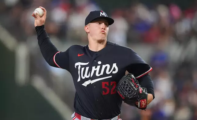 Minnesota Twins starting pitcher Zebby Matthews throws during the first inning of a baseball game against the Texas Rangers, Tuesday, June 16, 2026, in Arlington, Texas. (AP Photo/LM Otero)