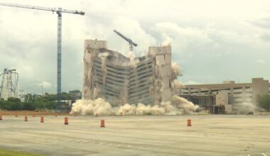 Demolition crews bring down Arlington's old Sheraton Hotel with dynamite