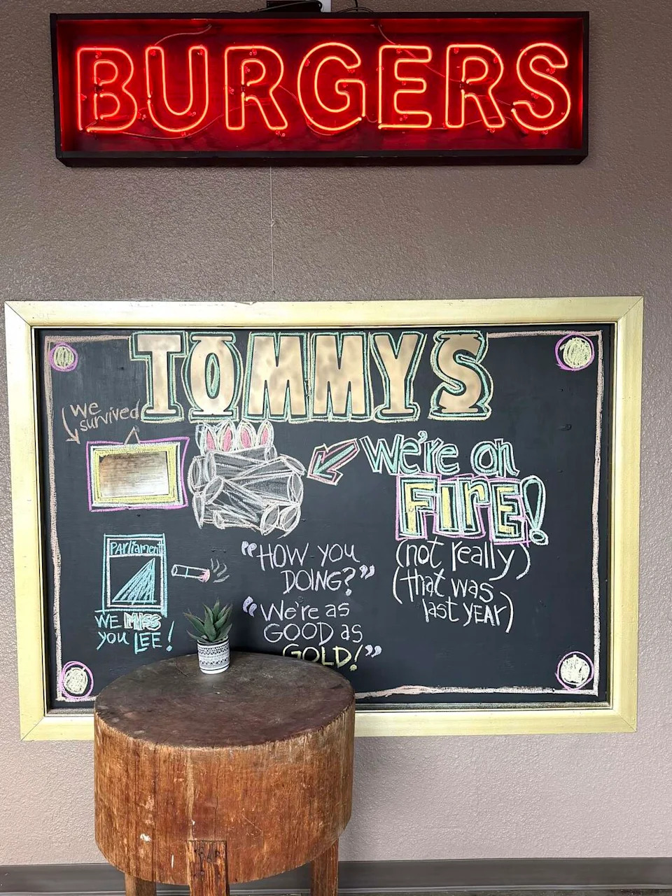 A new neon in the remodeled Tommy’s Hamburgers was added 24 years ago by co-founder Tommy Smith.