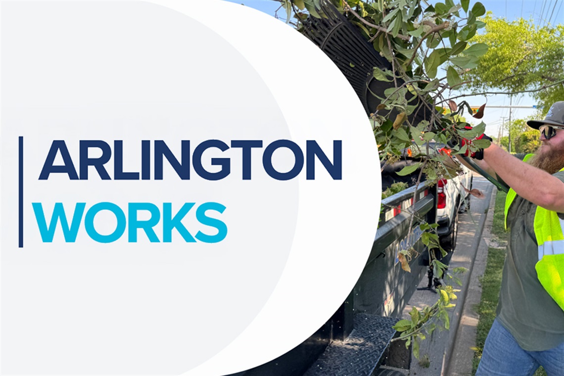 Arlington Works - City employee loading brushes into truck