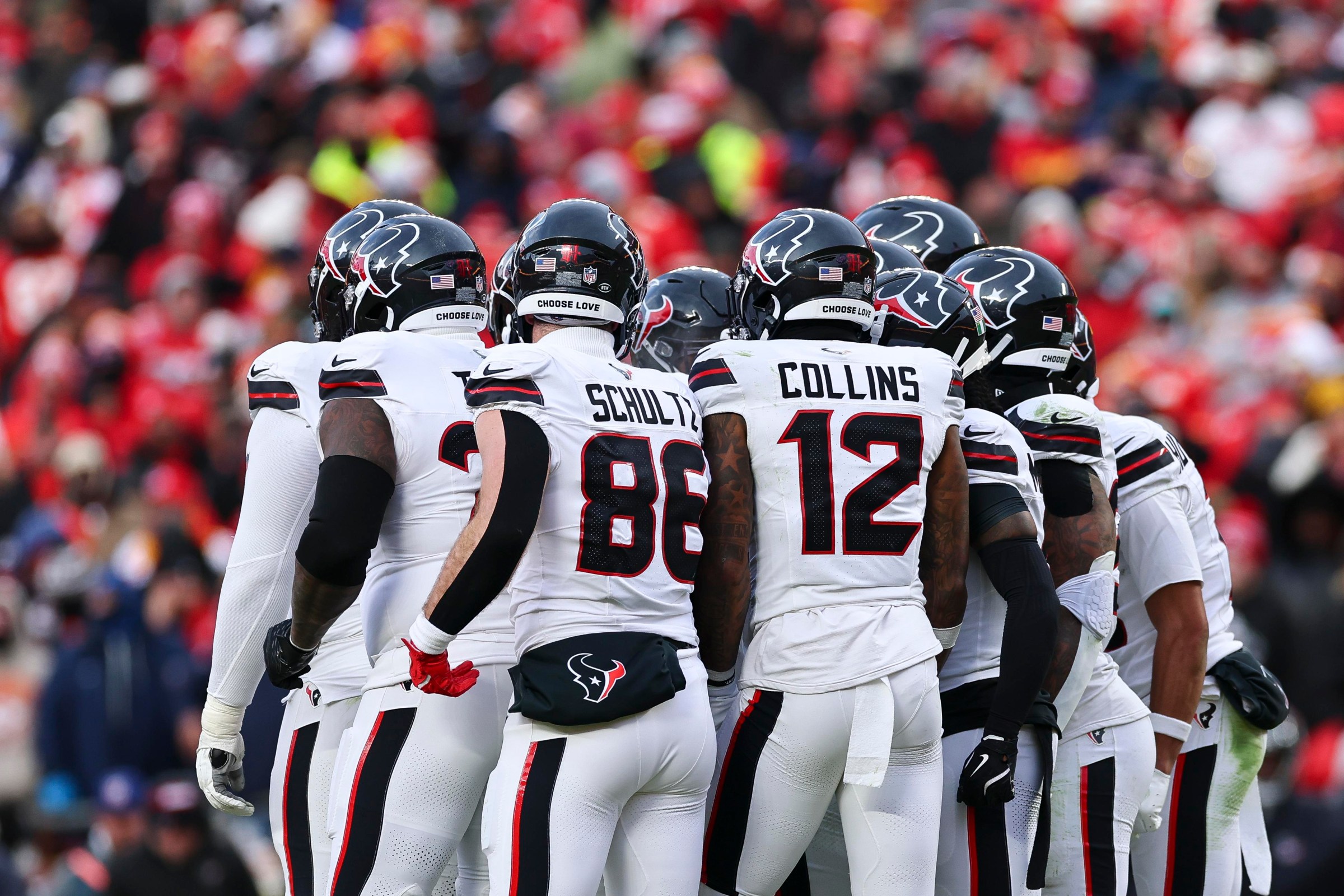 KANSAS CITY, MISSOURI - JANUARY 18: Houston Texans players huddle on offense during the first half of the AFC Divisional playoff game against the Kansas City Chiefs at GEHA Field at Arrowhead Stadium on January 18, 2025 in Kansas City, Missouri. (Photo by Aaron M. Sprecher/Getty Images)