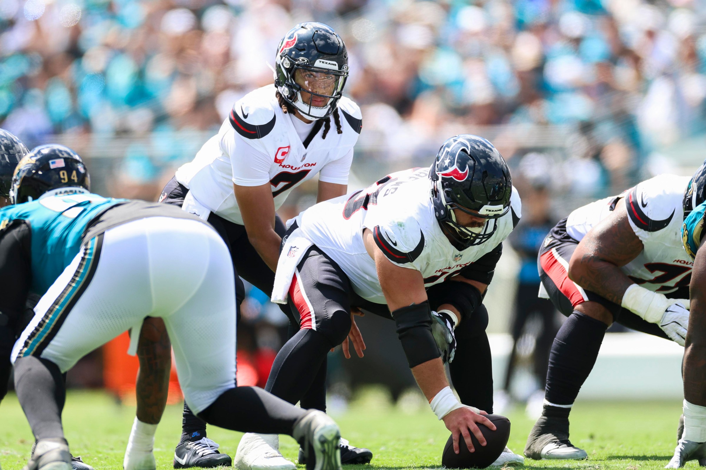 JACKSONVILLE, FLORIDA - SEPTEMBER 21: CJ. Stroud #7 of the Houston Texans under center at the line of scrimmage during an NFL football game against the Jacksonville Jaguars at Everbank Stadium on September 21, 2025 in Jacksonville, Florida. (Photo by Logan Bowles/Getty Images)