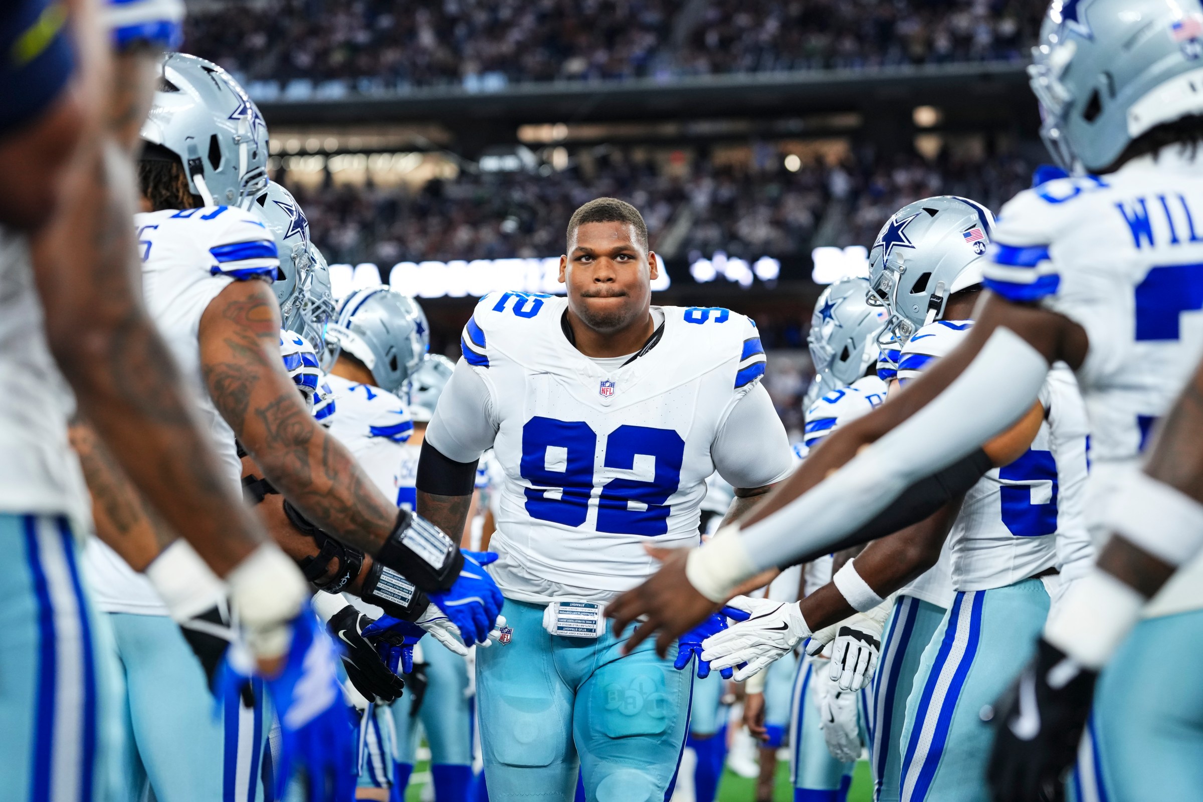 ARLINGTON, TX - NOVEMBER 23: Quinnen Williams #92 of the Dallas Cowboys runs out of the tunnel prior to an NFL football game against the Philadelphia Eagles at AT&T Stadium on November 23, 2025 in Arlington, Texas. (Photo by Cooper Neill/Getty Images)