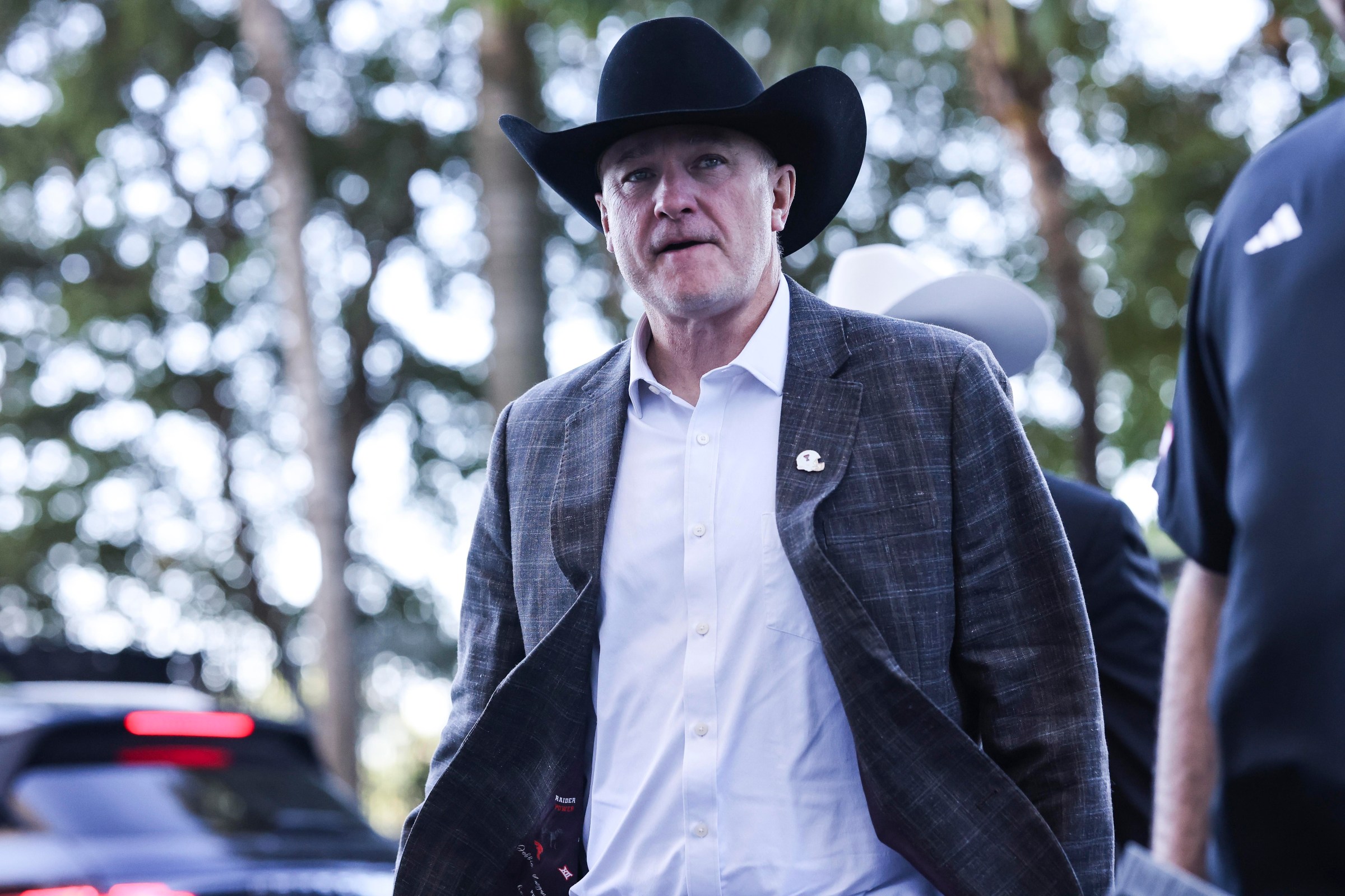 MIAMI GARDENS, FLORIDA - JANUARY 1: Head coach Joey McGuire of the Texas Tech Red Raiders walks off the bus before the College Football Playoff Quarter Final Game against the Oregon Ducks at Hard Rock Stadium on January 1, 2026 in Miami Gardens, Florida. (Photo by CFP/Getty Images)
