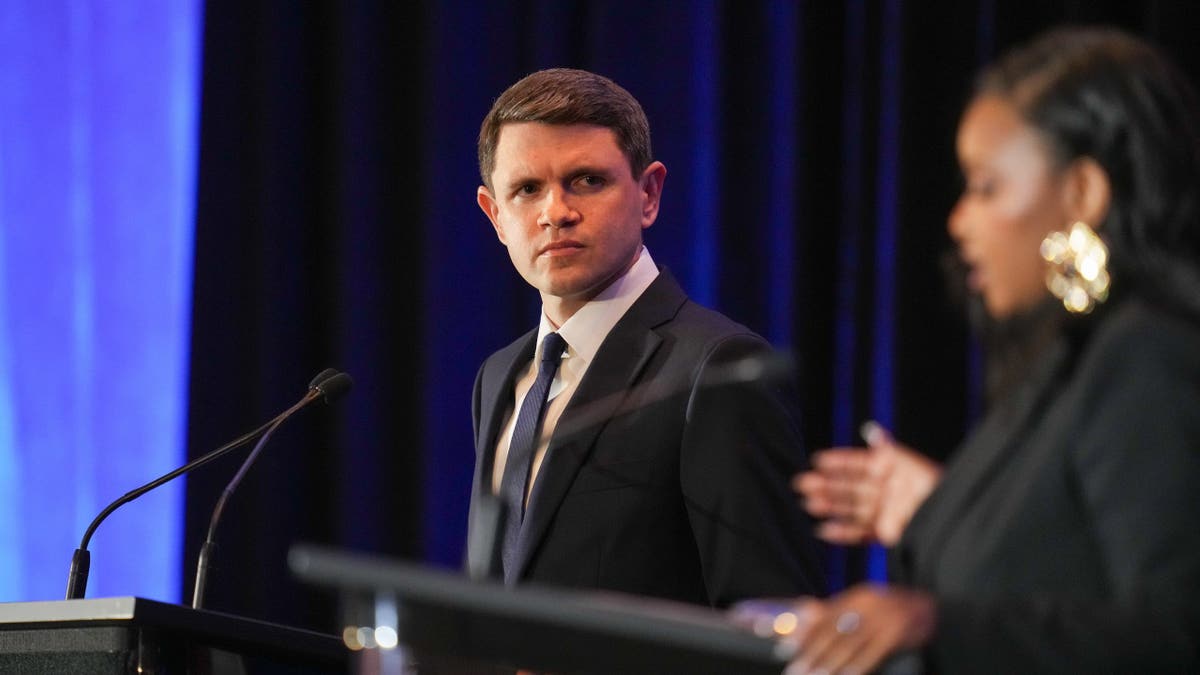 State Representative James Talarico speaking during a debate in Georgetown, Texas.