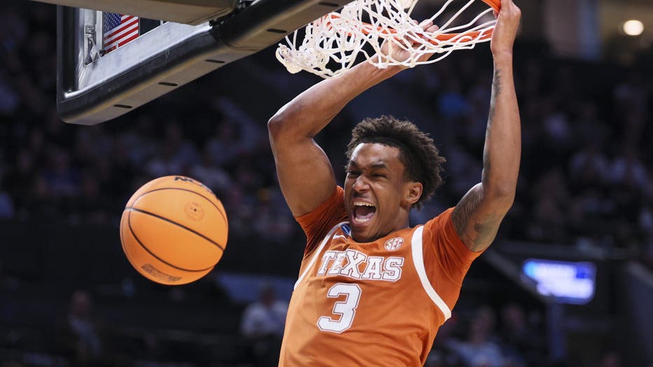 Dailyn Swain #3 of the Texas Longhorns dunks the ball against the Gonzaga Bulldogs during the second round of the 2026 NCAA Men's Basketball Tournament held at Moda Center on March 21, 2026 in Portland, Oregon. (Photo by C. Morgan Engel/NCAA Photos via Getty Images)
