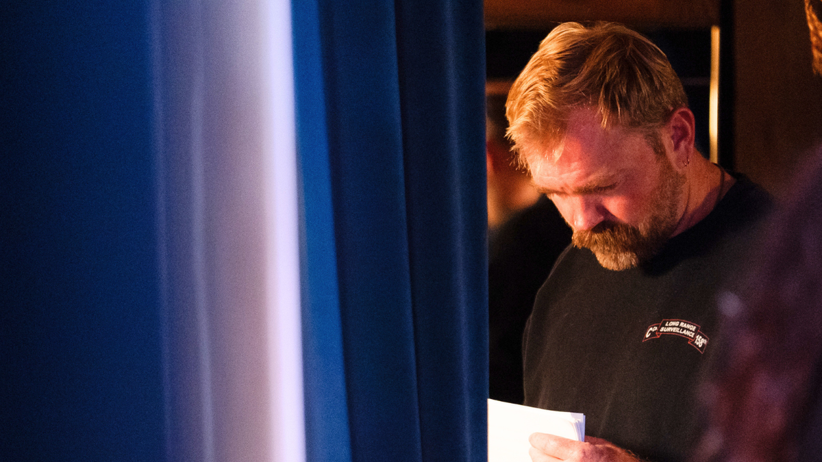 U.S. senatorial candidate from Maine Graham Platner waits for an introduction before addressing a town hall at the Leavitt Theater on October 22, 2025 in Ogunquit, Maine.