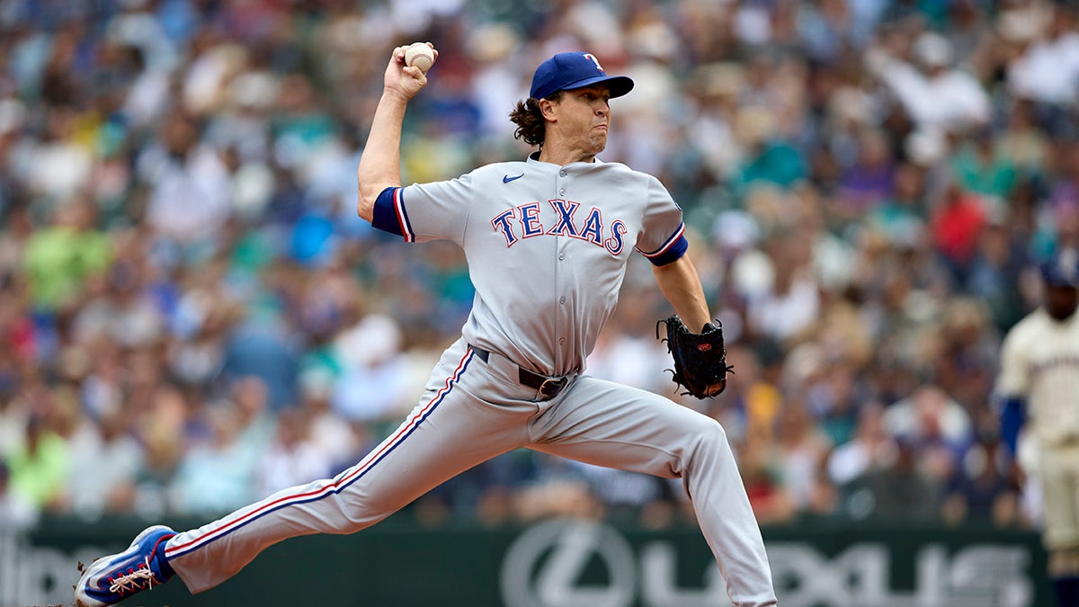 Texas Rangers starting pitcher Jacob deGrom throwing a pitch at T-Mobile Park