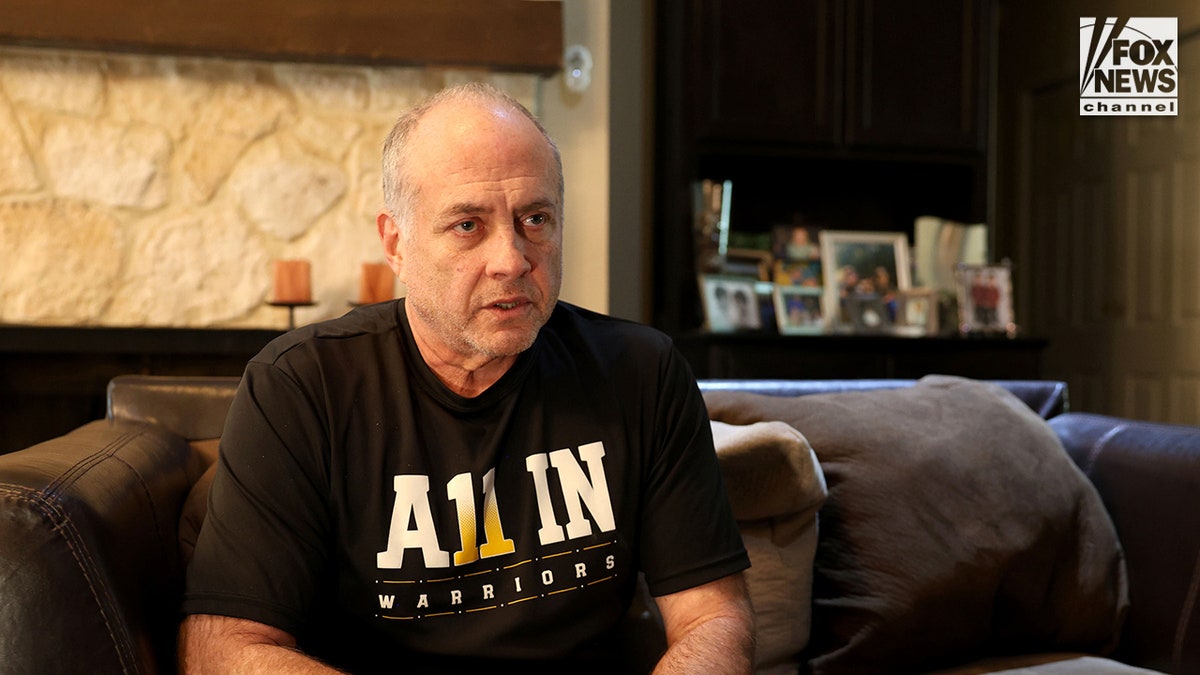 Jeff Metcalf sitting inside his home during an interview.