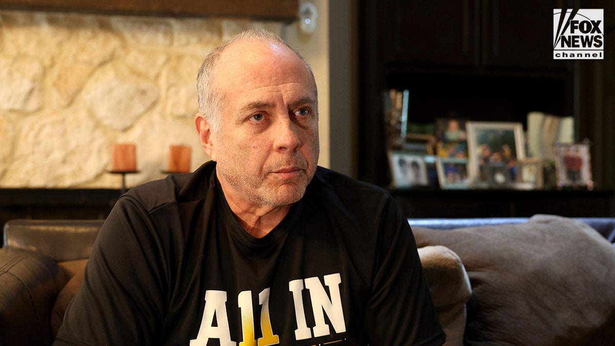 Jeff Metcalf sitting inside his home during an interview.