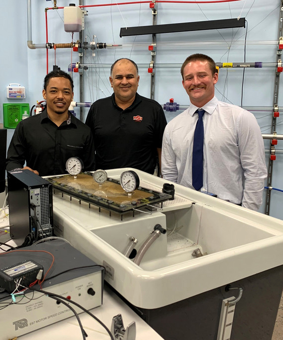 Joshua Murio with his Senior Design team