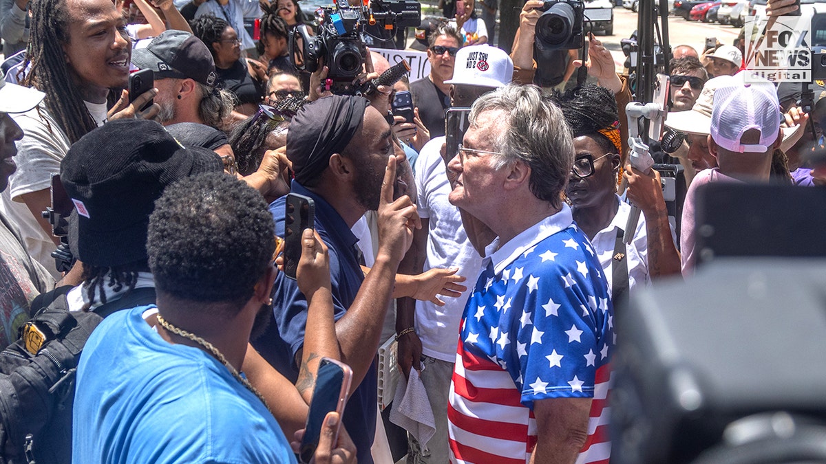People outside of Collin County Courthouse react as news of a verdict is announced in the Karmelo Anthony murder trial in McKinney, Texas, Tuesday, June 9, 2026. 