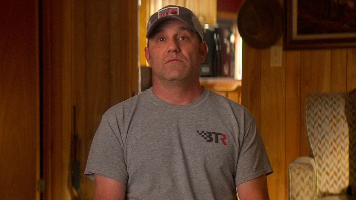 Marcus Brookes standing in a scene from Maternal Instinct.