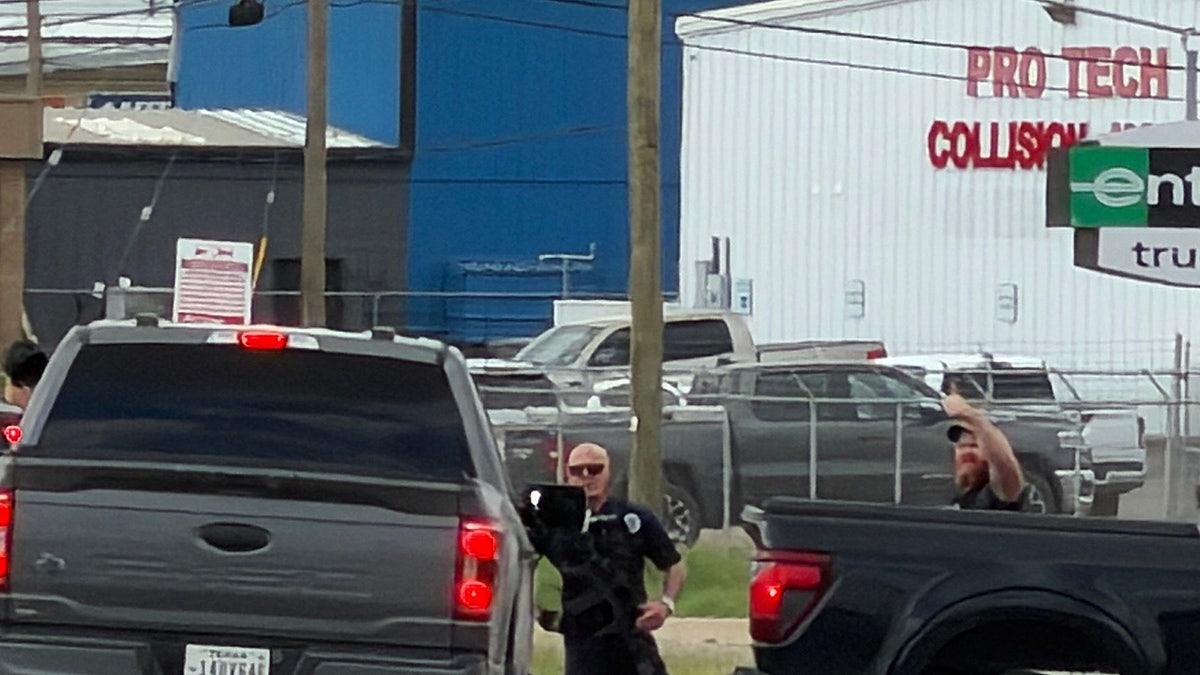 Law enforcement responds to an active shooting scene Friday, June 12, 2026, in Midland, Texas.