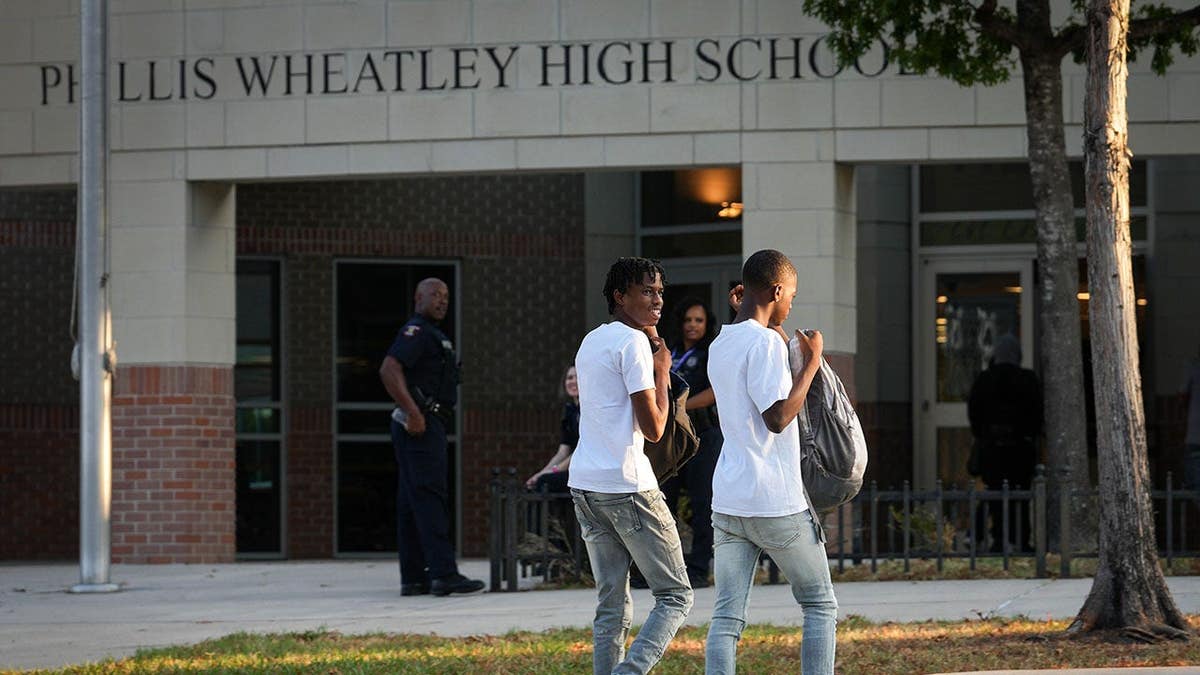 Students arriving at Phillis Wheatley High School in Houston on first day of school.