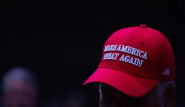 A photo of a red cap with the slogan "Make America Great Again."